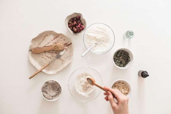 Natural ingredients and mixing bowls for creating homemade DIY hair masks